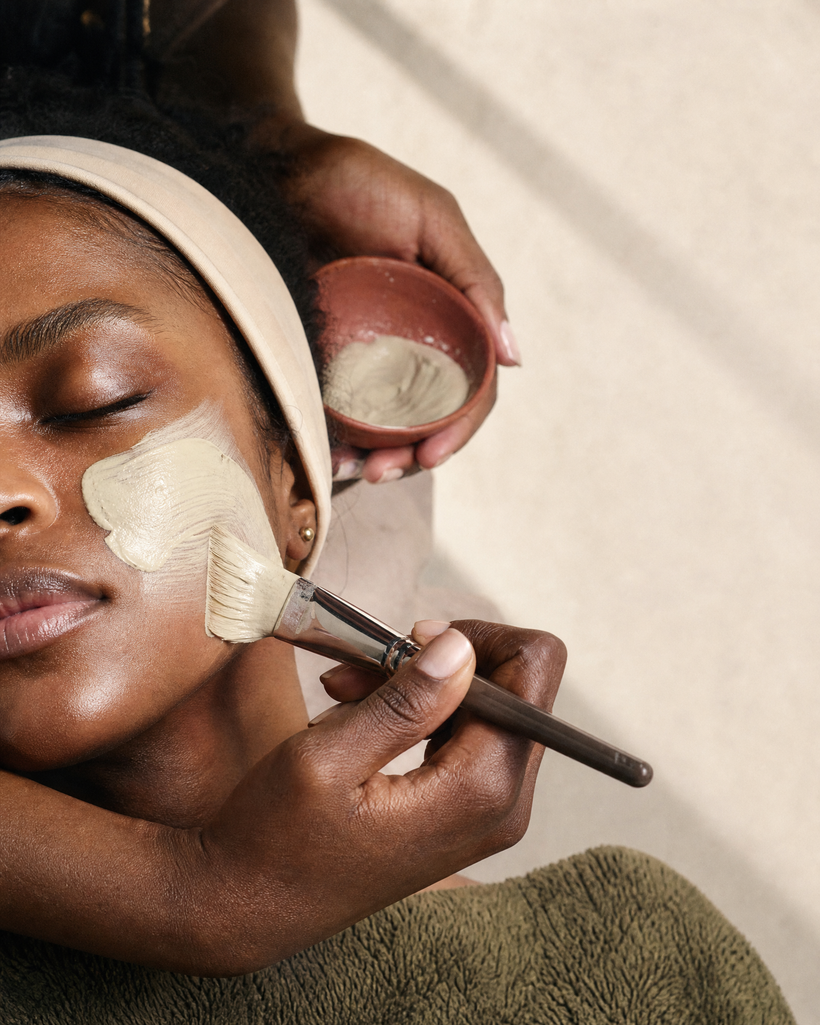Close portrait of luminous, freshly treated skin in the studio